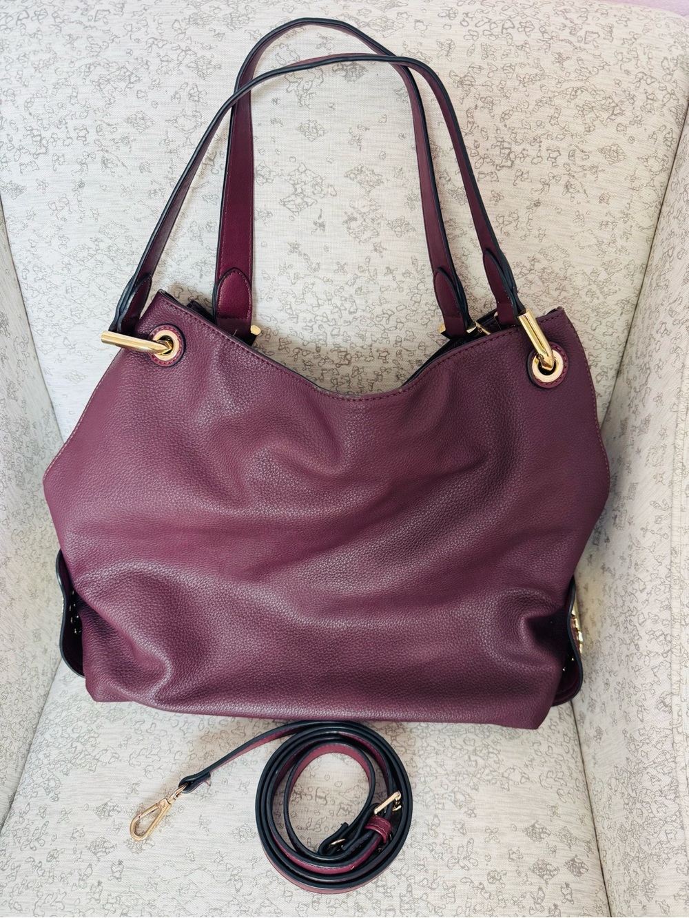 Celine Dion burgundy satchel